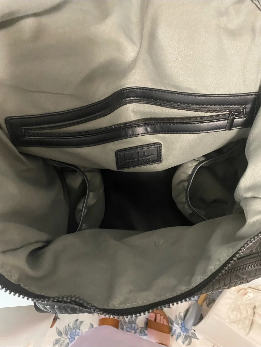Nicole Miller quilted side backpack